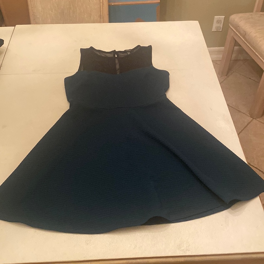 Green and black skater dress